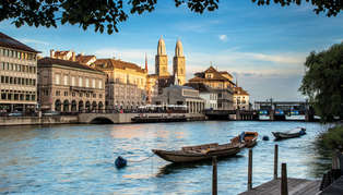 evening view of the schipfe on limmatquai with grossmuenster, zurich swiss_image_sts8589_314_179